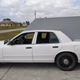 Illustration for article titled Someone Turned This Ford Crown Victoria Police Cruiser Into A Camper And It Is Glorious